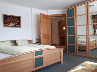 Ein Bett oder Betten in einem Zimmer der Unterkunft Gästehaus Jäger