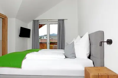 Ein Bett oder Betten in einem Zimmer der Unterkunft Appartementhaus Sky Lodge