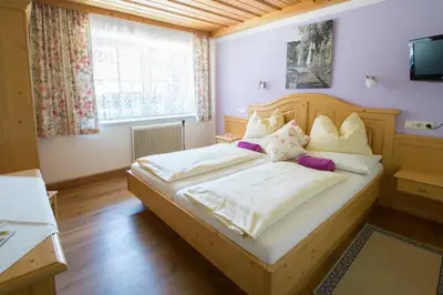 Ein Bett oder Betten in einem Zimmer der Unterkunft Bauernhof Kasleitner