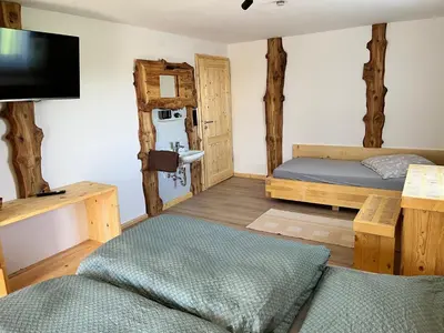 Ein Bett oder Betten in einem Zimmer der Unterkunft Ferienwohnung Kaltenleitner