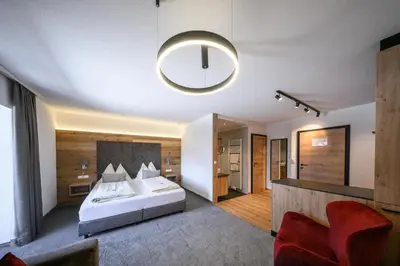 Ein Bett oder Betten in einem Zimmer der Unterkunft Hotel Sonnfeld