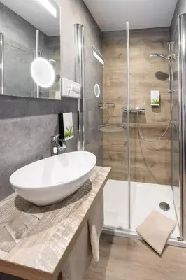 Ein Badezimmer in der Unterkunft Hotel Sonnfeld