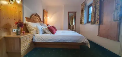 Ein Bett oder Betten in einem Zimmer der Unterkunft Schlosserhaus Appartements