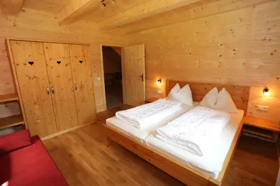 Ein Bett oder Betten in einem Zimmer der Unterkunft Hüttendorf Schladming