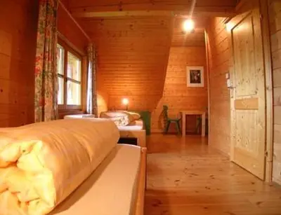 Ein Bett oder Betten in einem Zimmer der Unterkunft Appartement Ramsau, Haus Fichte