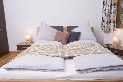 Ein Bett oder Betten in einem Zimmer der Unterkunft Oberschartlhof