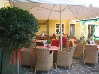 Ein Sitzbereich in der Unterkunft Hotel-Pension Wagnermigl