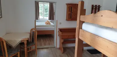 Ein Bett oder Betten in einem Zimmer der Unterkunft Pension Pürcherhof