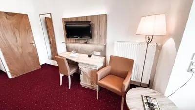 Ein Sitzbereich in der Unterkunft Hotel Garni Pension zur Wacht