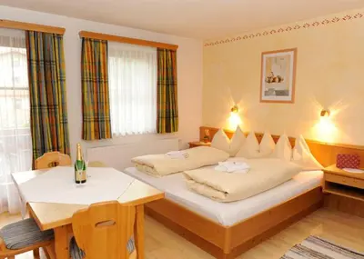 Ein Bett oder Betten in einem Zimmer der Unterkunft Pension Unterhof