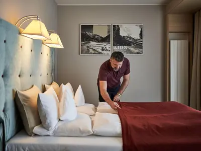 Ein Bett oder Betten in einem Zimmer der Unterkunft aja Bergresort Werfenweng