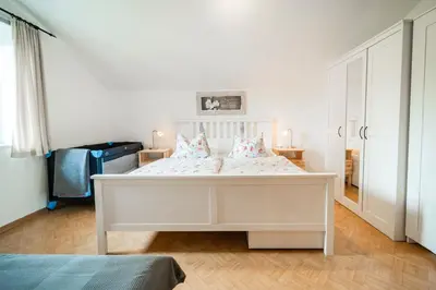 Ein Bett oder Betten in einem Zimmer der Unterkunft Ferienwohnung Seilbahn