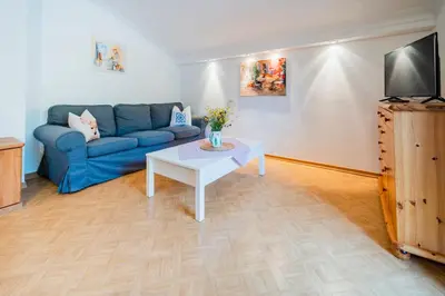 Ein Sitzbereich in der Unterkunft Ferienwohnung Seilbahn