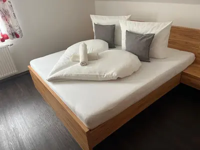 Ein Bett oder Betten in einem Zimmer der Unterkunft Apartment Schlickenhof
