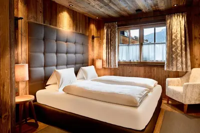 Ein Bett oder Betten in einem Zimmer der Unterkunft Promi Alm Flachau - Luxus Chalets