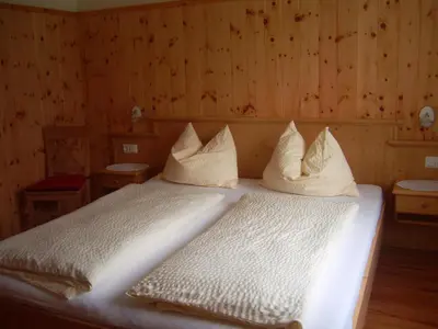 Ein Bett oder Betten in einem Zimmer der Unterkunft Privatpension Gosaukammblick