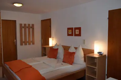 Ein Bett oder Betten in einem Zimmer der Unterkunft Hotel Pension Schwaiger