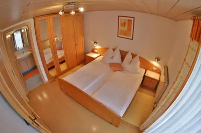 Ein Bett oder Betten in einem Zimmer der Unterkunft Haus Regina