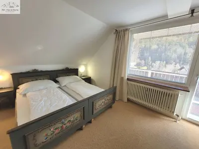 Ein Bett oder Betten in einem Zimmer der Unterkunft Wohnung Katalin