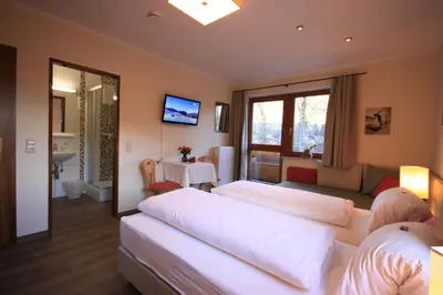 Ein Bett oder Betten in einem Zimmer der Unterkunft Haus Alexander
