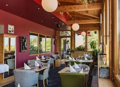 Ein Sitzbereich in der Unterkunft Hotel Berghof