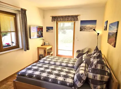 Ein Bett oder Betten in einem Zimmer der Unterkunft Appartement BERGTRÄUME
