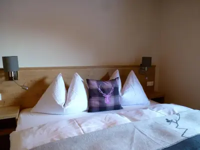 Ein Bett oder Betten in einem Zimmer der Unterkunft Haus am Reiteckweg
