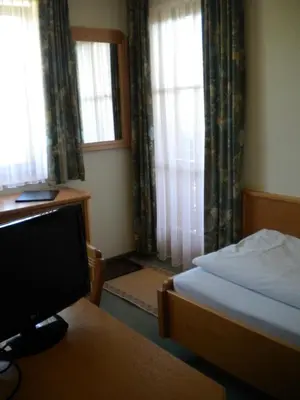 Ein Bett oder Betten in einem Zimmer der Unterkunft Pension Köberl