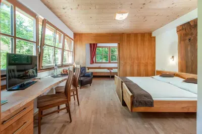 Ein Bett oder Betten in einem Zimmer der Unterkunft Familienhotel Unterreith