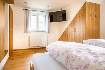 Ein Bett oder Betten in einem Zimmer der Unterkunft Biohof Untergrabenbauer