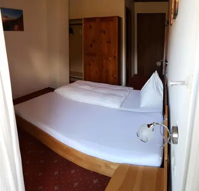 Ein Bett oder Betten in einem Zimmer der Unterkunft Landgasthof Hotel Zehenthof