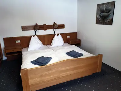 Ein Bett oder Betten in einem Zimmer der Unterkunft Landgasthof Hotel Zehenthof