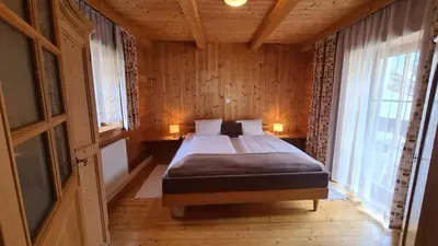 Ein Bett oder Betten in einem Zimmer der Unterkunft Dependance II