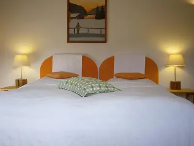 Ein Bett oder Betten in einem Zimmer der Unterkunft Sonnwirtstöckl am See