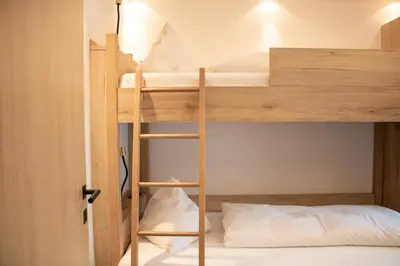 Ein Bett oder Betten in einem Zimmer der Unterkunft Gasthof Gosauschmied