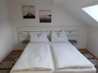 Ein Bett oder Betten in einem Zimmer der Unterkunft Apartment zur Schmiede - by myNests