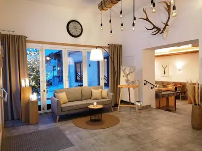 Ein Sitzbereich in der Unterkunft FORSTAUERWiRT Hotel & Restaurant
