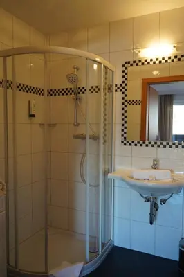 Ein Badezimmer in der Unterkunft Bucheggerhof