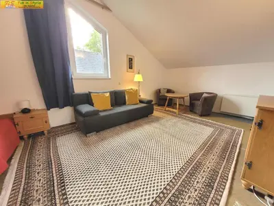 Ein Sitzbereich in der Unterkunft Haus Erika