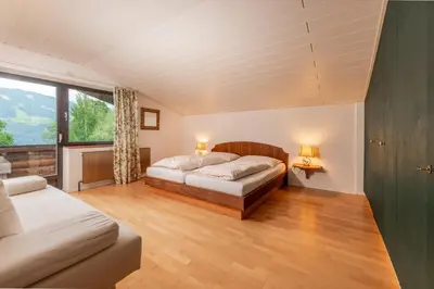 Ein Bett oder Betten in einem Zimmer der Unterkunft Landhaus Blaubeerhügel