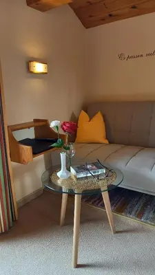 Ein Sitzbereich in der Unterkunft Pension Felsenheim