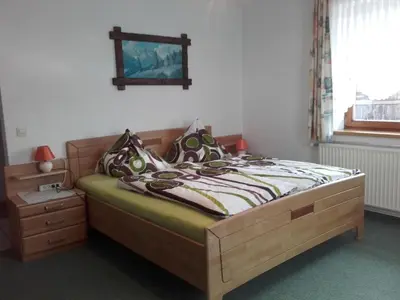 Ein Bett oder Betten in einem Zimmer der Unterkunft Rainzhof