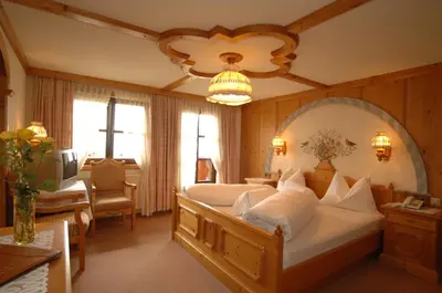 Ein Bett oder Betten in einem Zimmer der Unterkunft Hotel Neuwirt