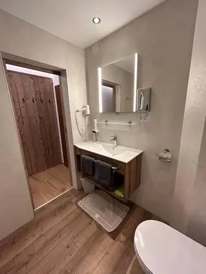 Ein Badezimmer in der Unterkunft Smarthotel inAlpe