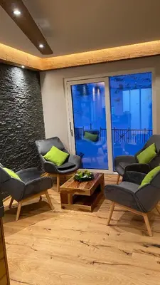 Ein Sitzbereich in der Unterkunft Smarthotel inAlpe