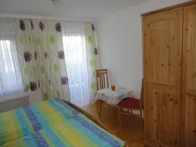 Ein Bett oder Betten in einem Zimmer der Unterkunft Bauernhof Strumegg