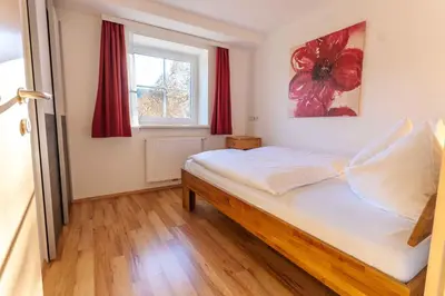 Ein Bett oder Betten in einem Zimmer der Unterkunft Apartment Eisl