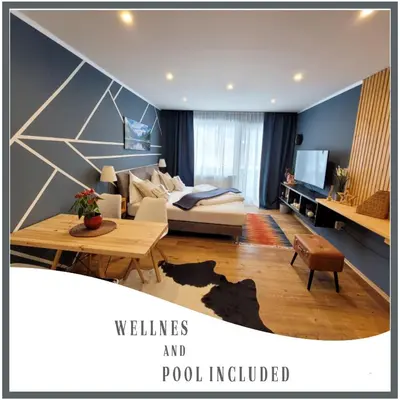 Ein Bett oder Betten in einem Zimmer der Unterkunft Alpine Studio with Indoor Pool & Spa included - 10 min from Hallstatt