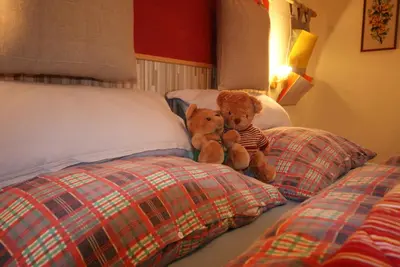Ein Bett oder Betten in einem Zimmer der Unterkunft Sattelberg