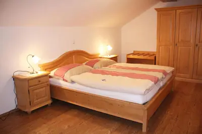 Ein Bett oder Betten in einem Zimmer der Unterkunft Kanzlerhof